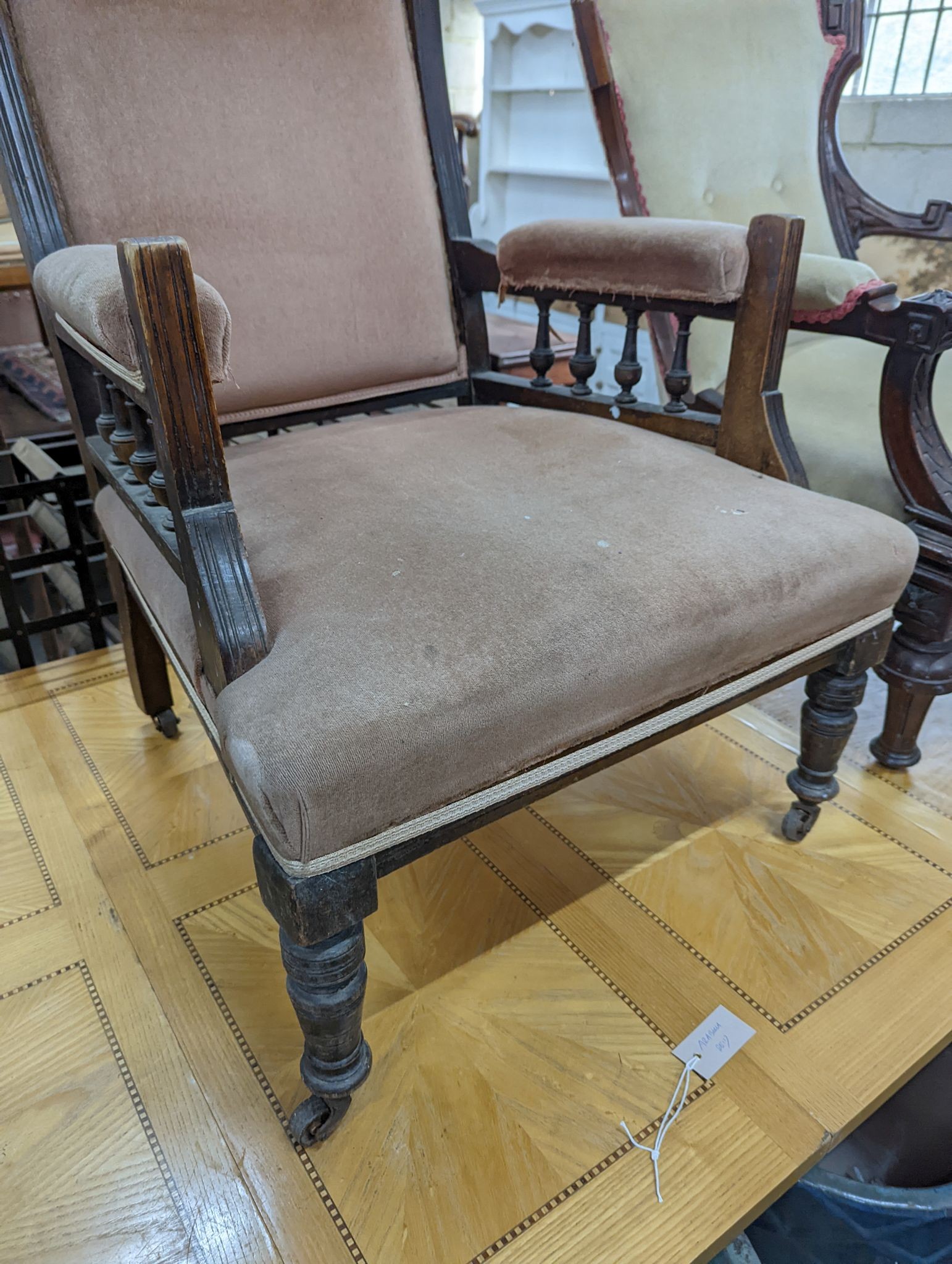 Two Victorian mahogany upholstered open armchairs